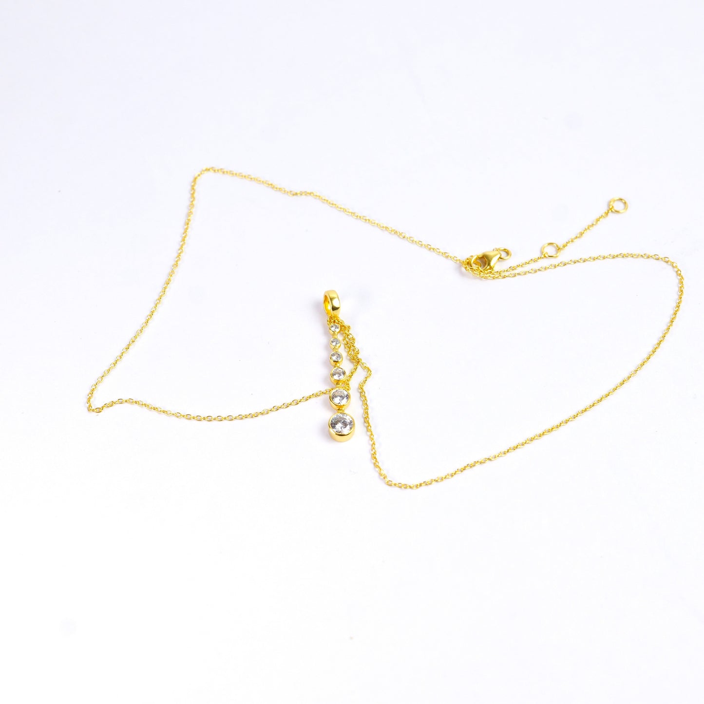 FALLING PENDANT- GOLD