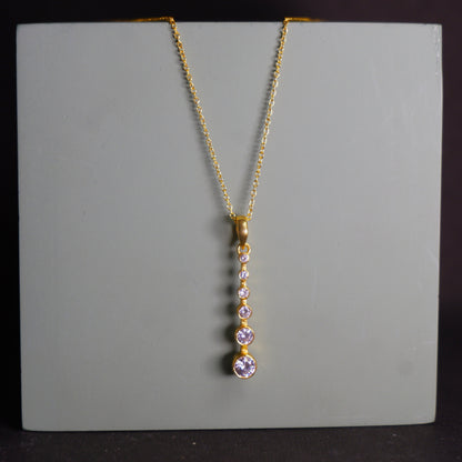 FALLING PENDANT- GOLD